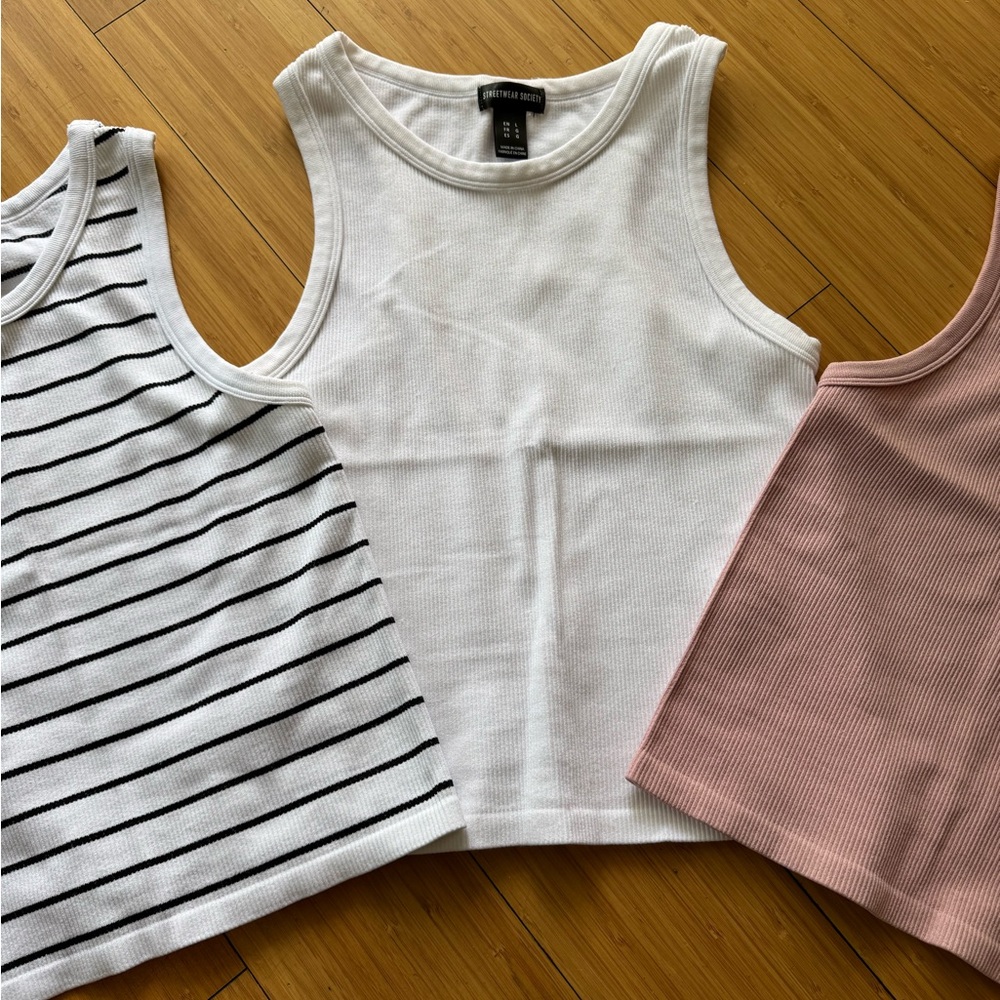 White, Striped, and Pink Ribbed Tank Tops